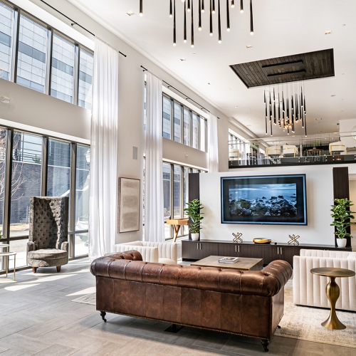 Industrial common space area with high end seating and views